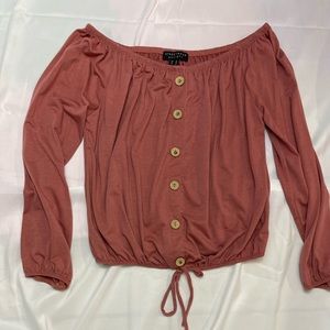 Woman’s off the shoulder blouse